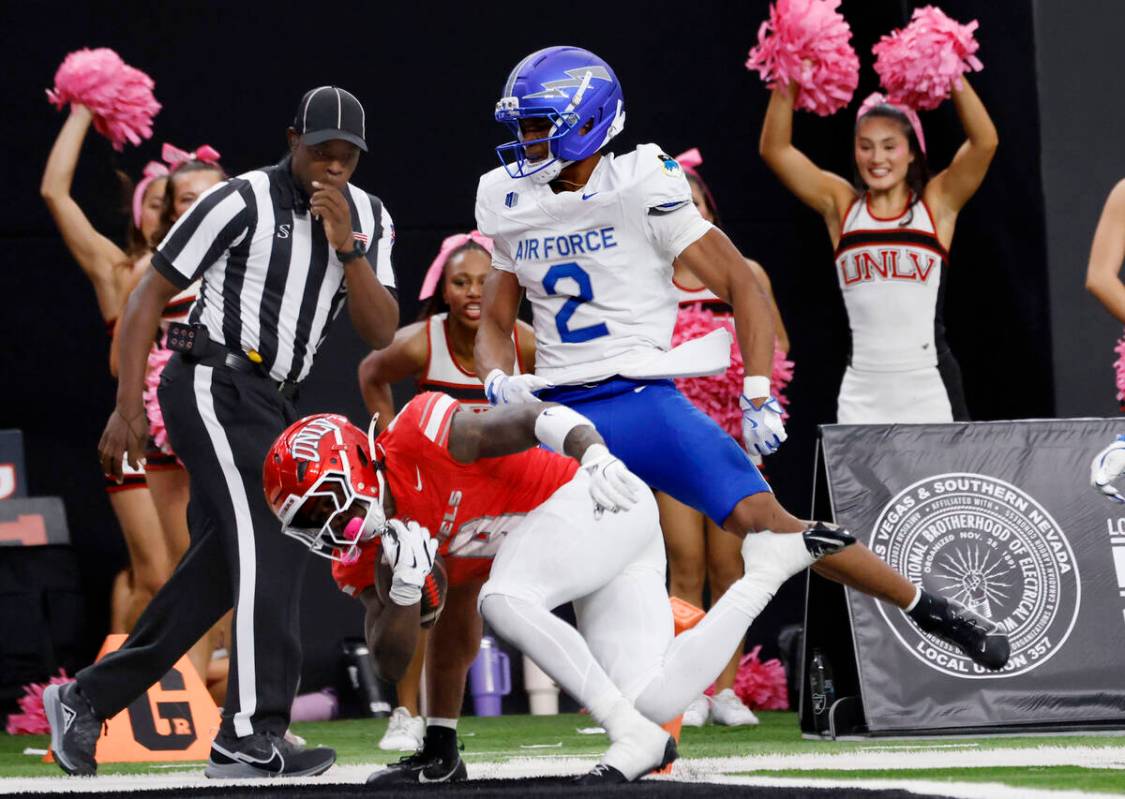 UNLV running back Jai'Den Thomas (9) scores a touchdown as Air Force Falcons defensive bac ...