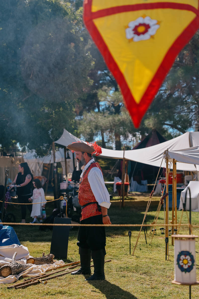 Members of the Order of the Azure Rose roast a pig during the 31st annual Age of Chivalry: Rena ...