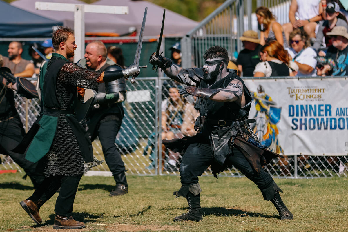 Performers with different guilds battle in a show during the 31st annual Age of Chivalry: Renai ...