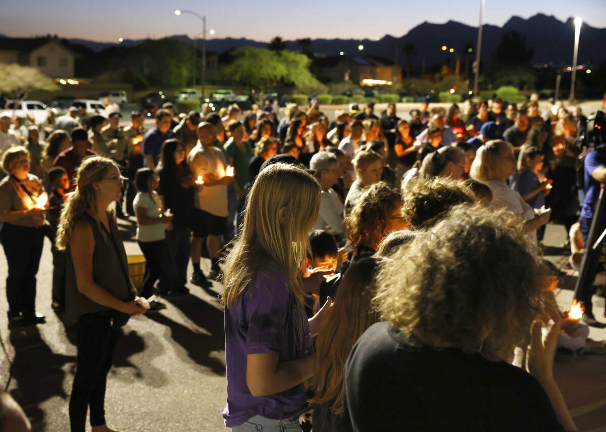 People attend a prayer vigil for Haylee Ryan, the 12-year-old girl who was hit and killed by a ...