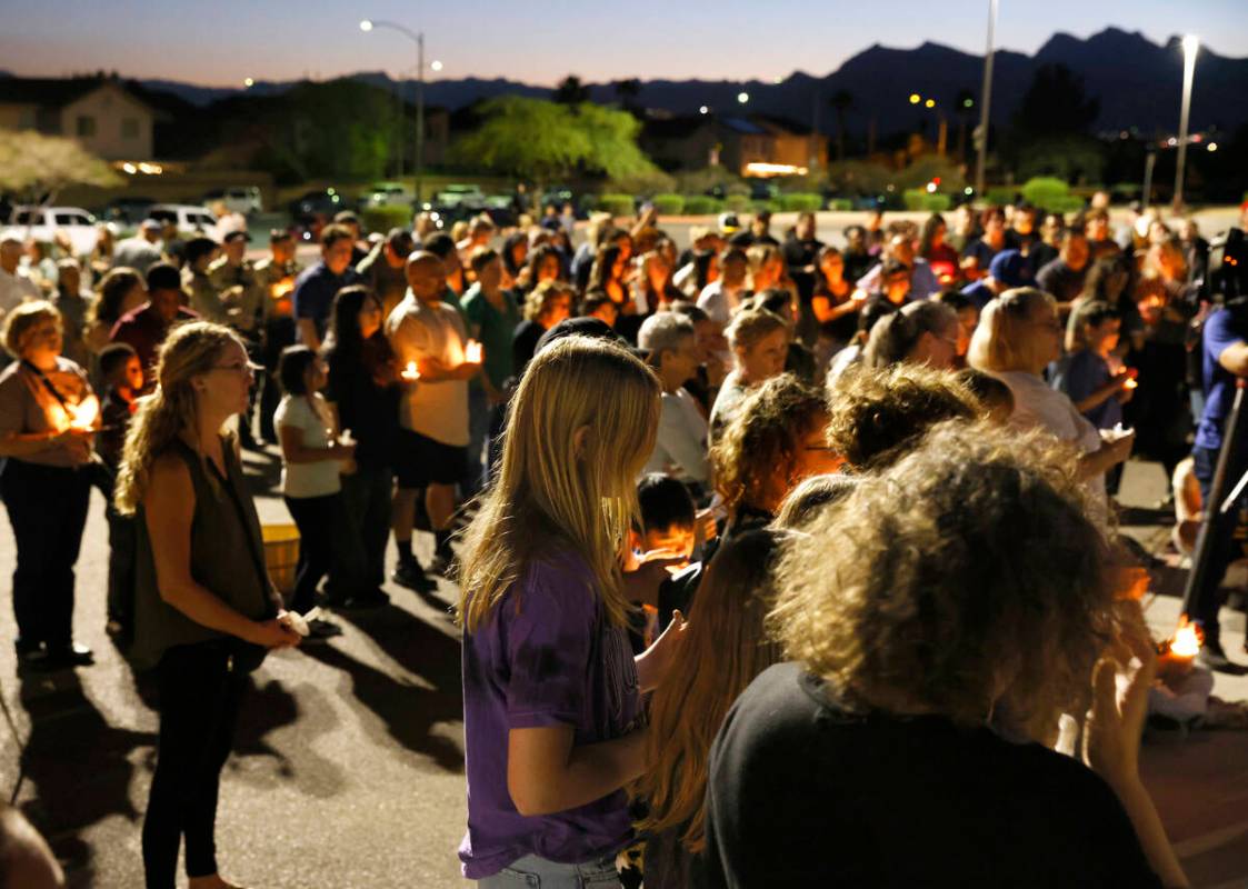 People attend a prayer vigil for Haylee Ryan, the 12-year-old girl who was hit and killed by a ...