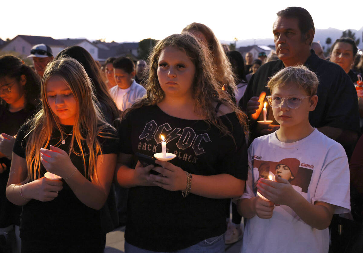 People attend a prayer vigil for Haylee Ryan, the 12-year-old girl who was hit and killed by a ...