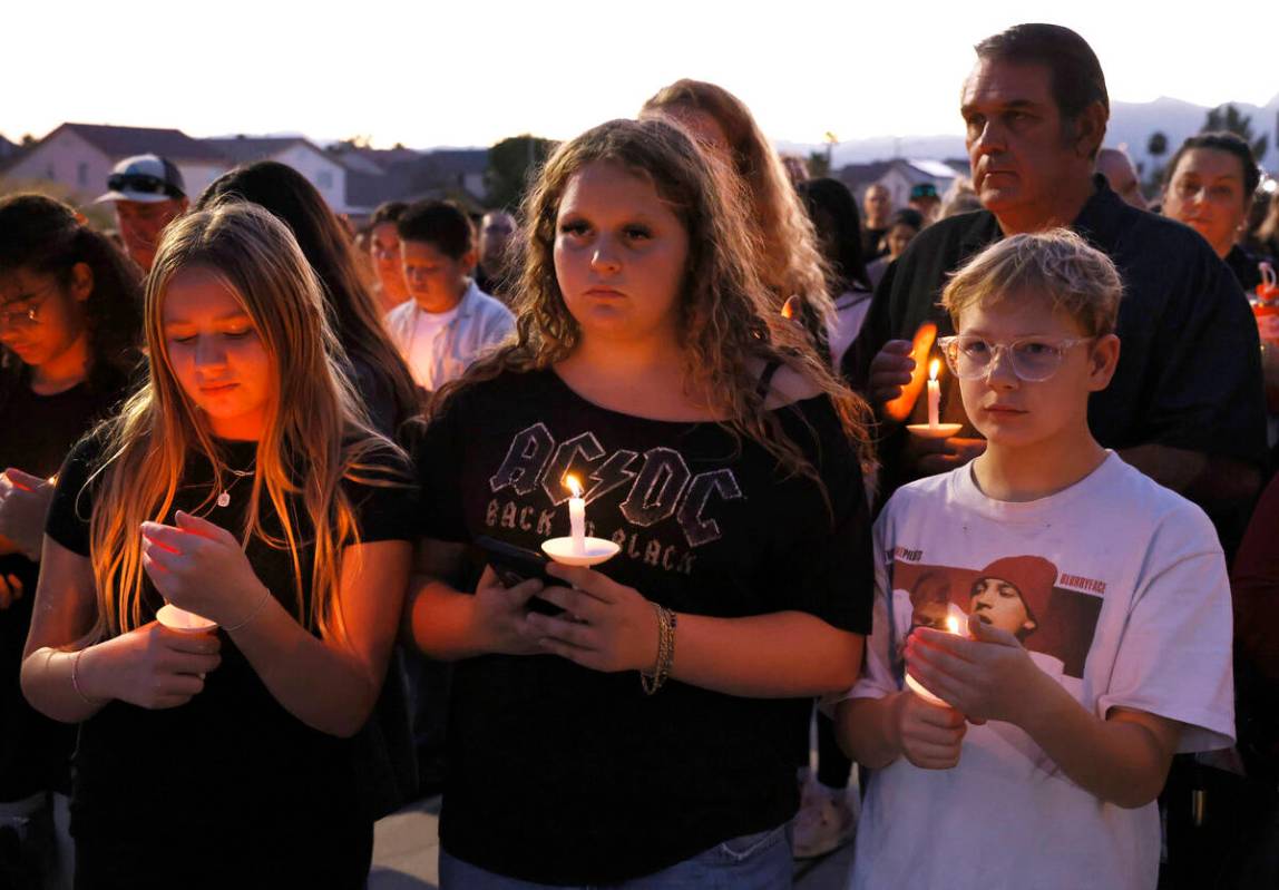People attend a prayer vigil for Haylee Ryan, the 12-year-old girl who was hit and killed by a ...