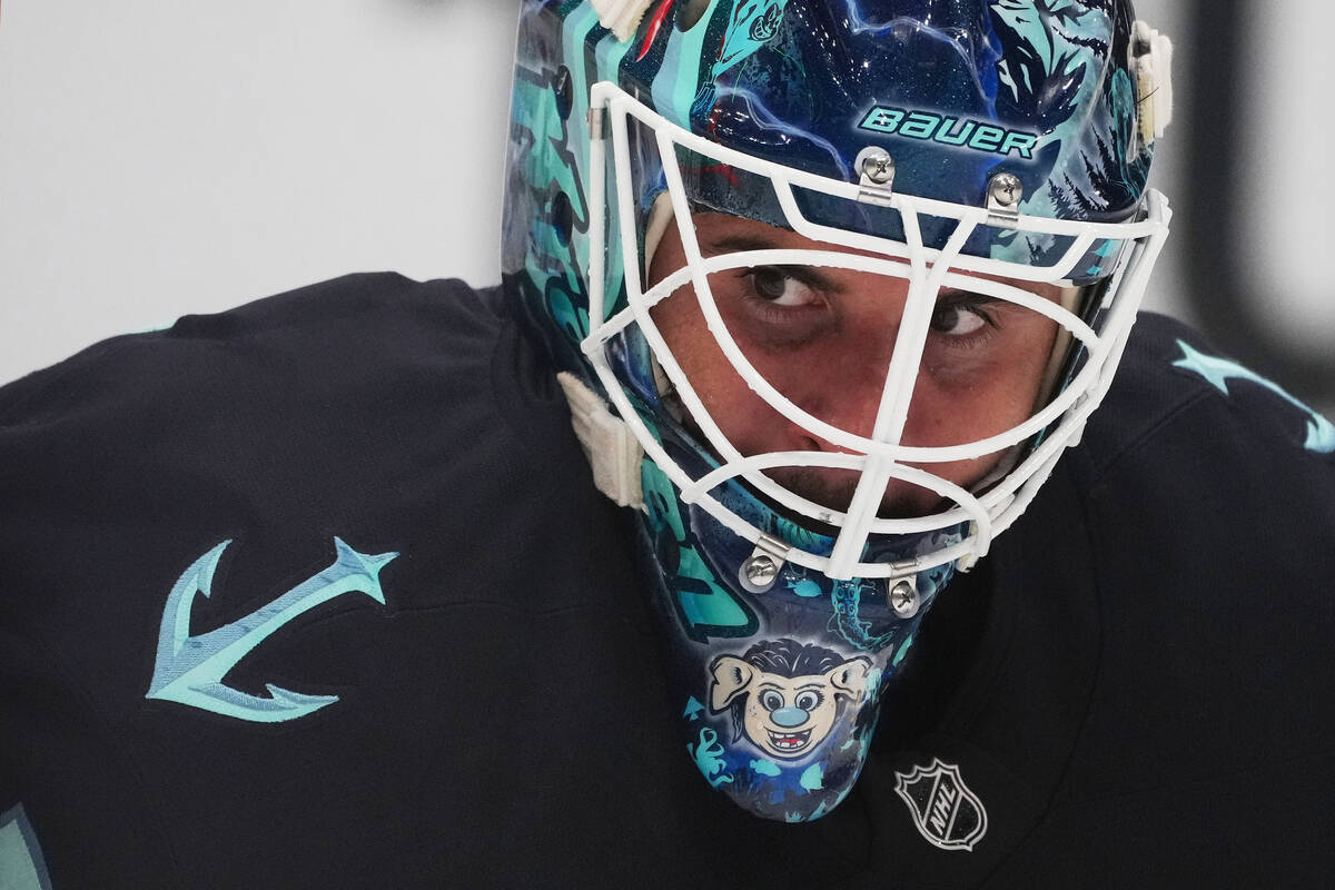 Seattle Kraken goaltender Joey Daccord looks on during the second period of an NHL hockey game ...