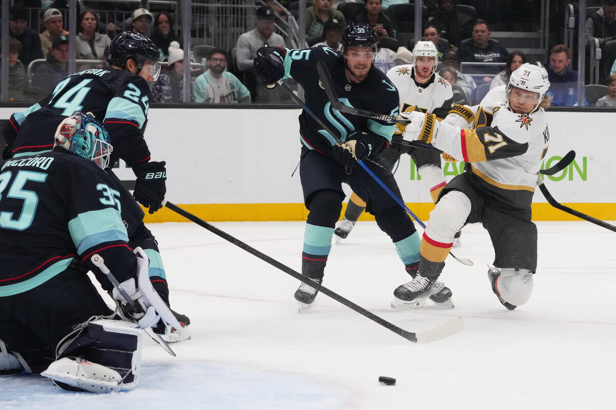 Vegas Golden Knights center William Karlsson (71) makes a shot that's deflected against Se ...