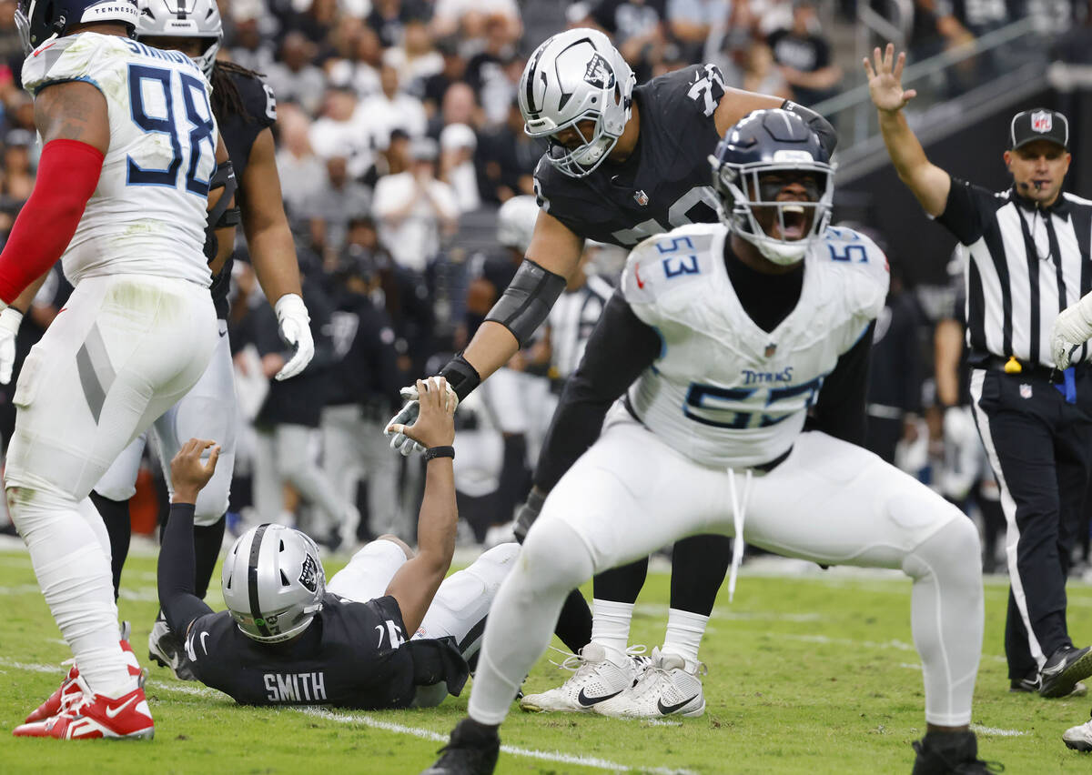 Tennessee Titans linebacker Jihad Ward (53) reacts after Raiders quarterback Geno Smith (7) is ...