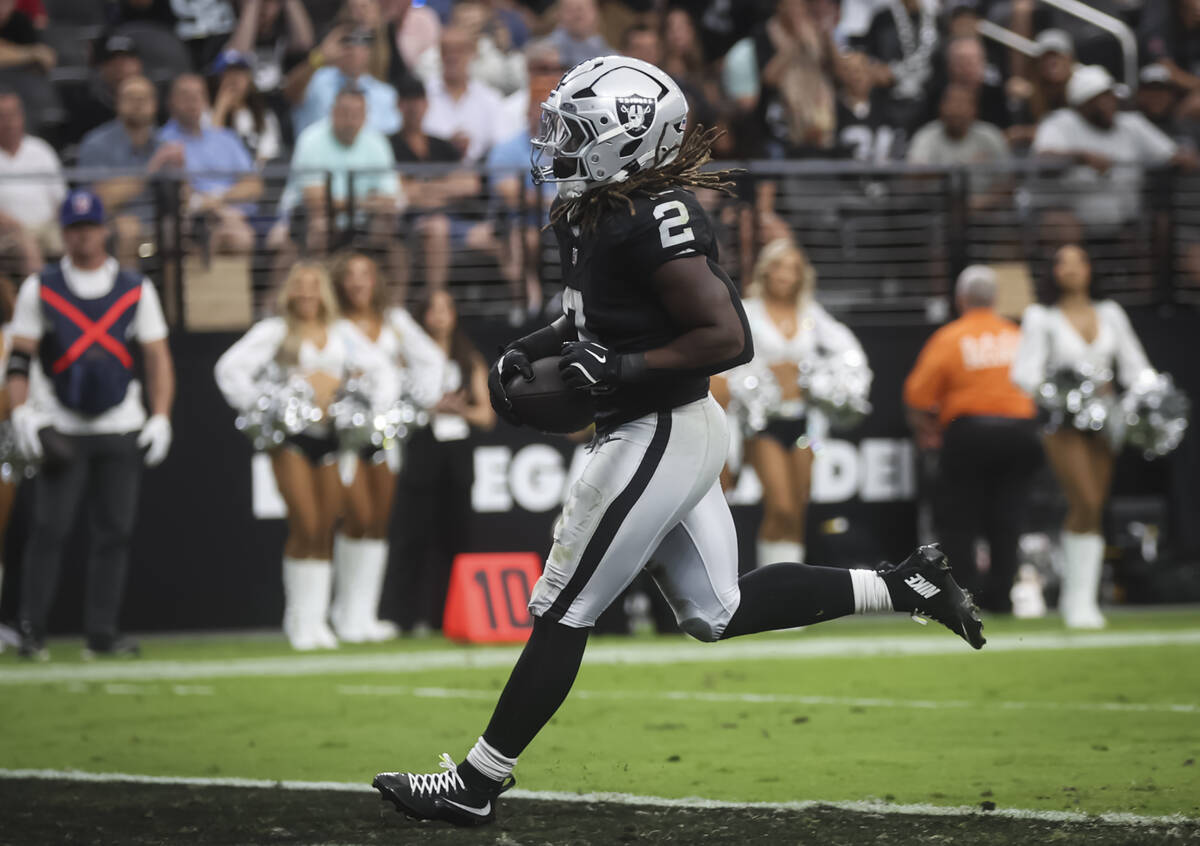 Raiders running back Ashton Jeanty (2) scores a touchdown against the Tennessee Titans during t ...