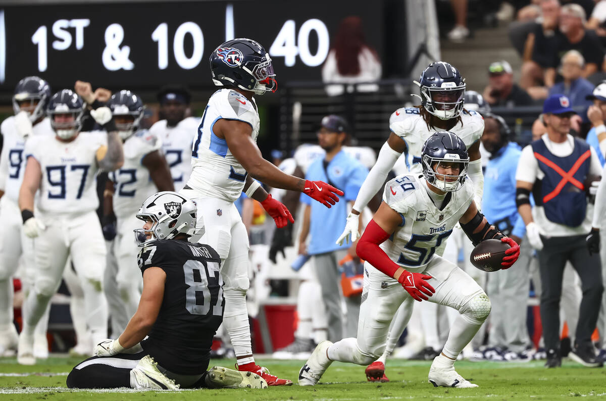Tennessee Titans linebacker Cody Barton (50) looks on after intercepting a pass intended for Ra ...
