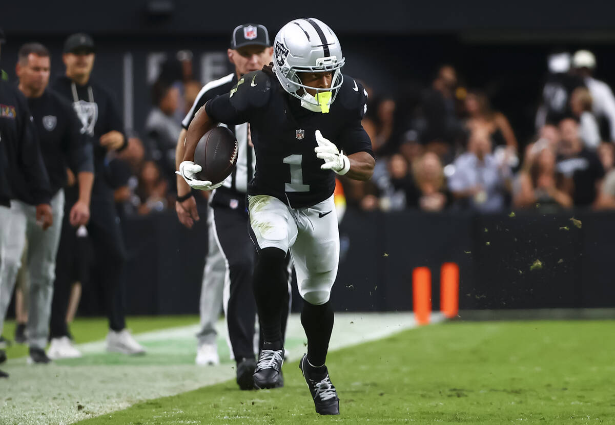 Raiders wide receiver Tre Tucker (1) runs the ball against the Tennessee Titans during the seco ...