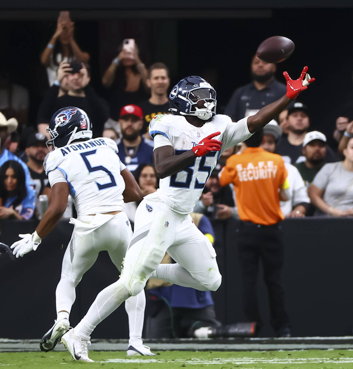 Tennessee Titans tight end Chig Okonkwo (85) reaches out for the reception during the second ha ...