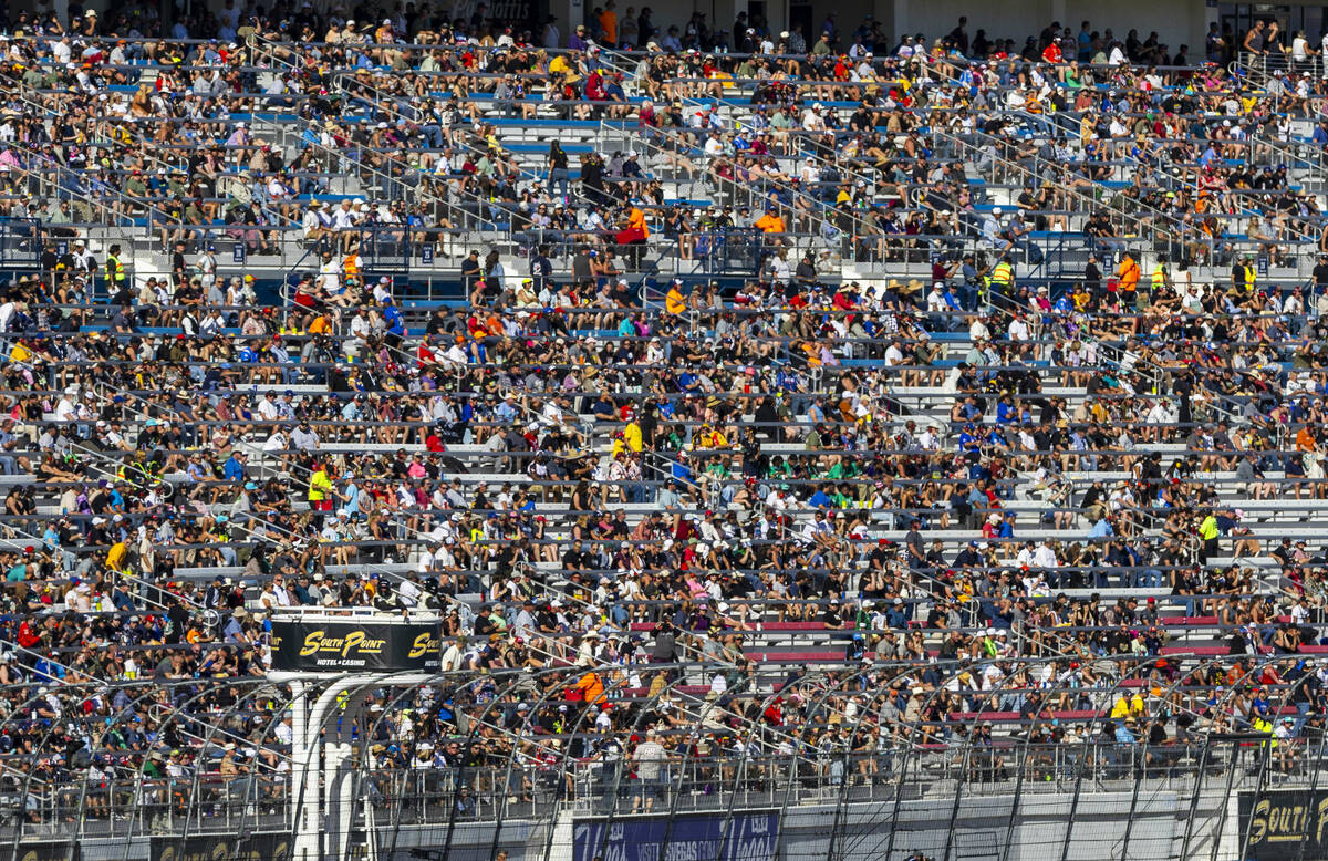 Fans cheers as drivers move past during the NASCAR Cup Series South Point 400 race at Las Vegas ...