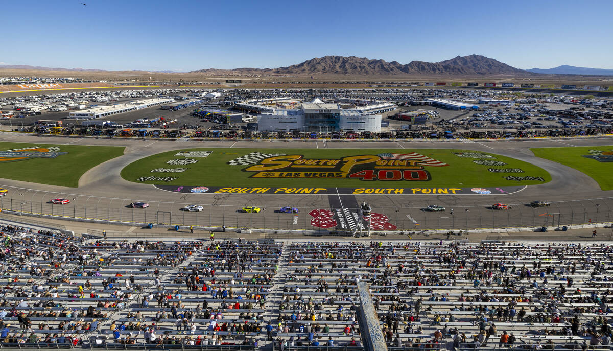 Cars make their way around the track during the NASCAR Cup Series South Point 400 race at Las V ...