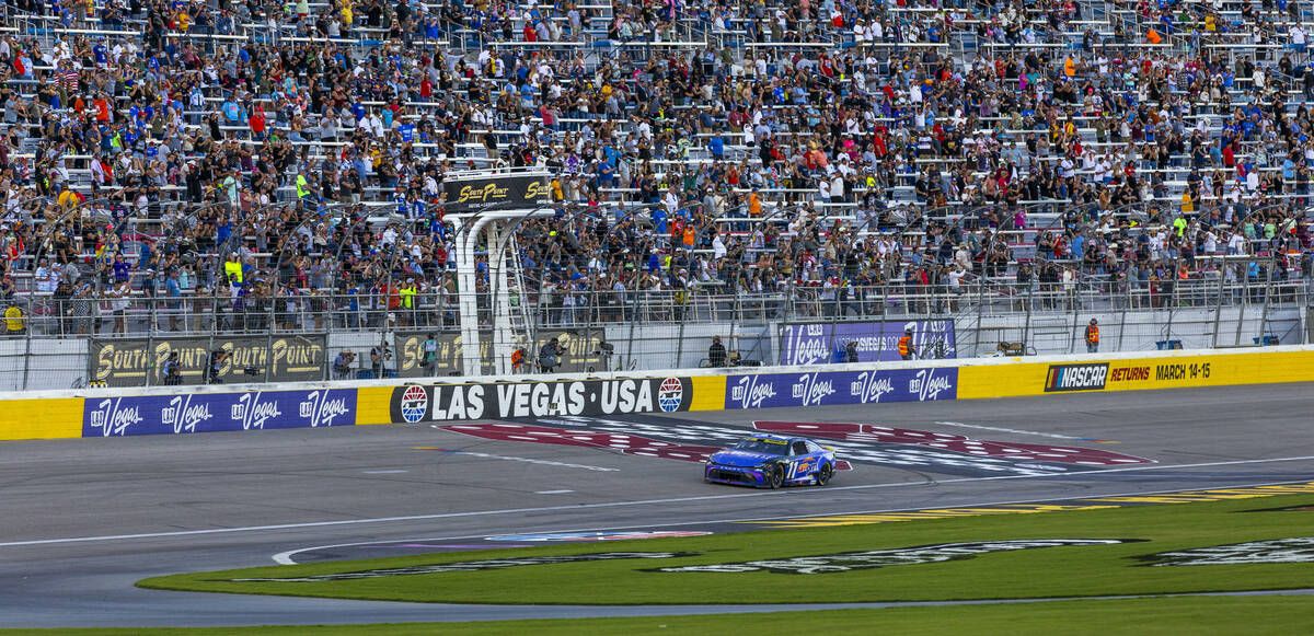 Denny Hamlin (11) wins the NASCAR Cup Series South Point 400 race at Las Vegas Motor Speedway o ...