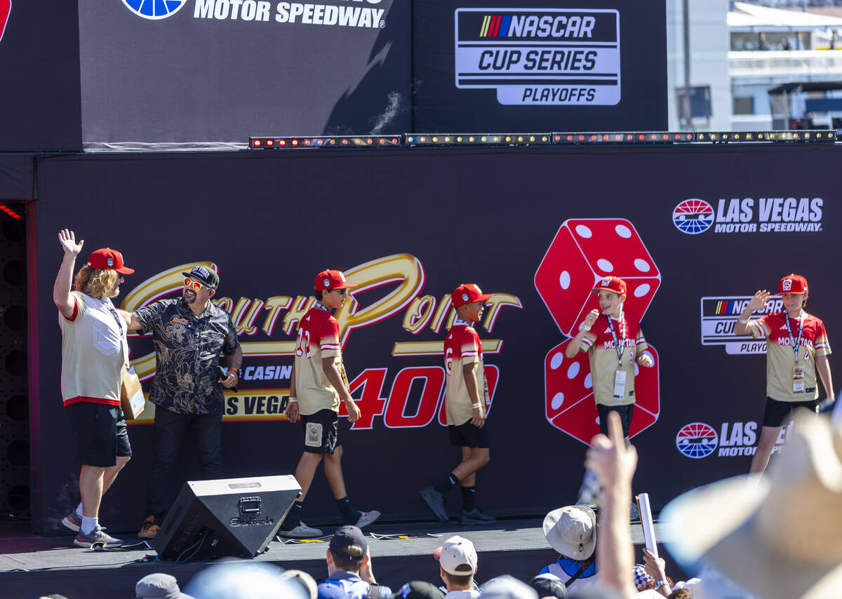 The Summerlin South Little League team players are announced as honorary race officials the NAS ...