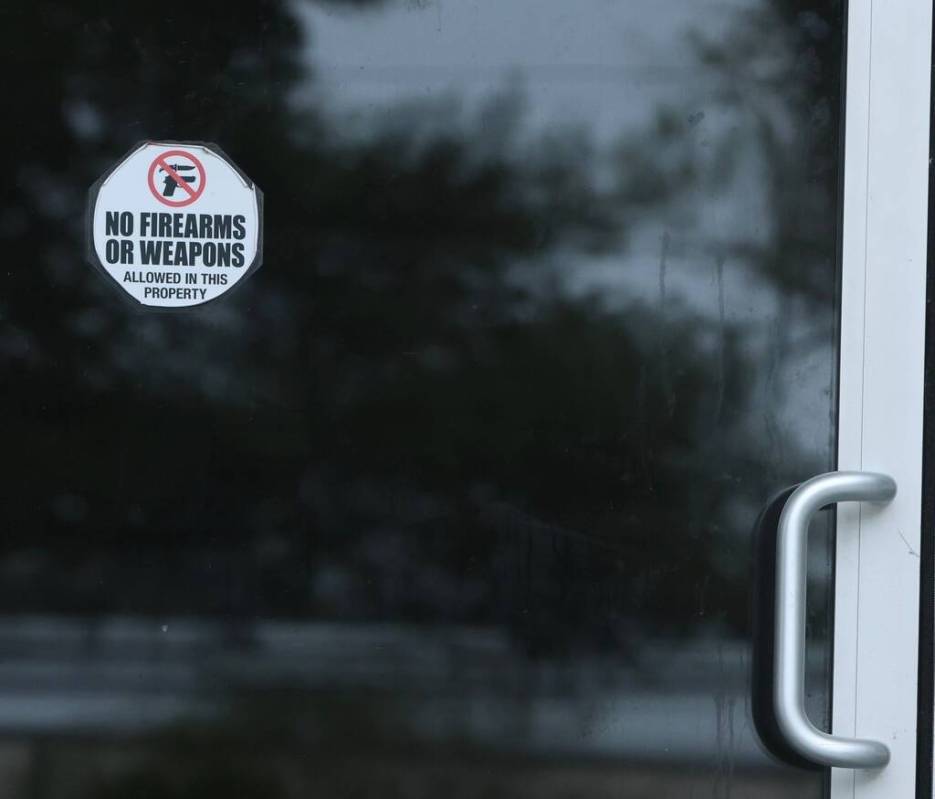 A sticker on the door of Willie's Bar and Grill in St Helena Island, S.C. after a shooting ...
