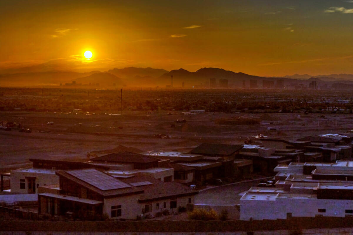 The sun rises over the valley and Strip on Thursday, July 20, 2023, in Las Vegas (L.E. Baskow/L ...