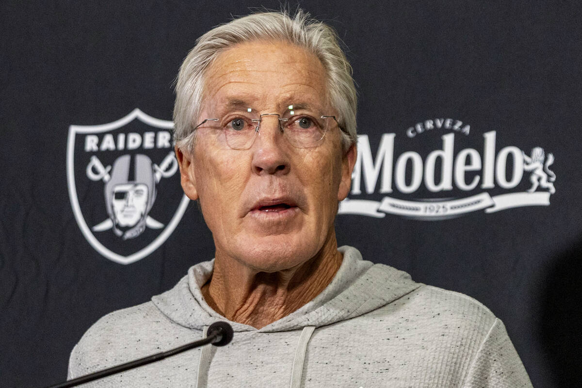 Raiders head coach Pete Carroll takes questions from the media during a news conference at the ...