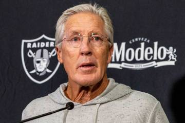 Raiders head coach Pete Carroll takes questions from the media during a news conference at the ...