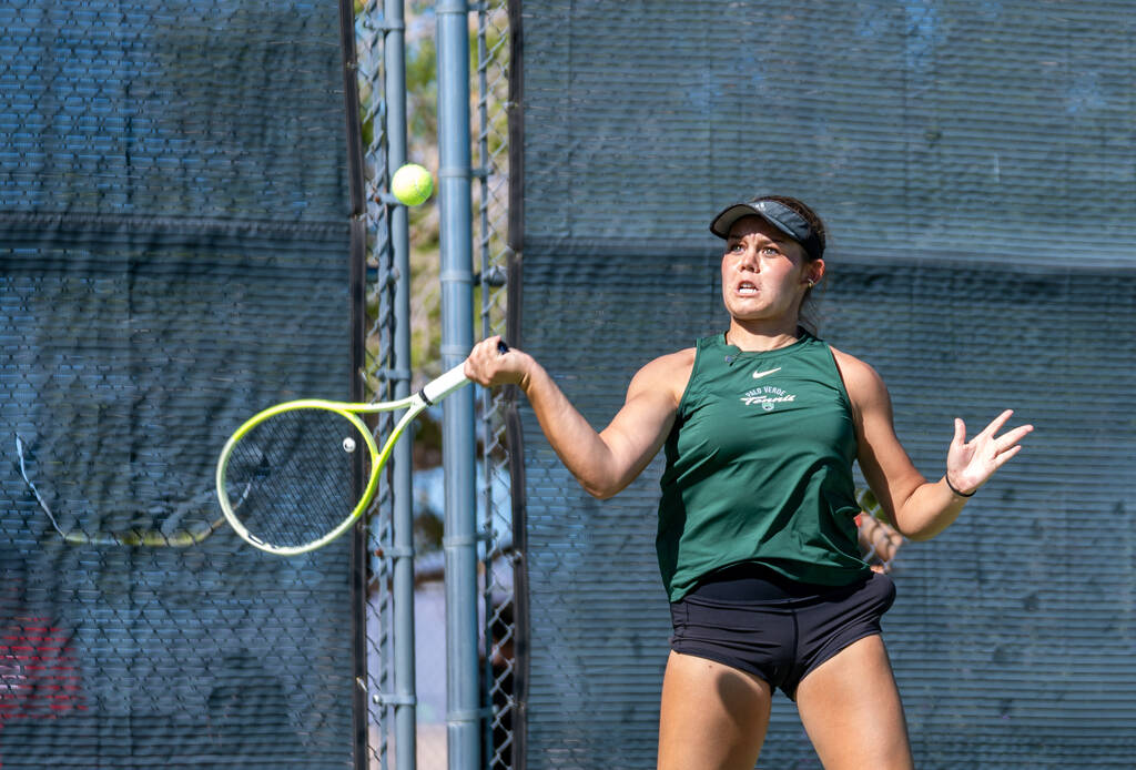Palo Verde’s Remi Rice returns the ball during a high school tennis match against Corona ...