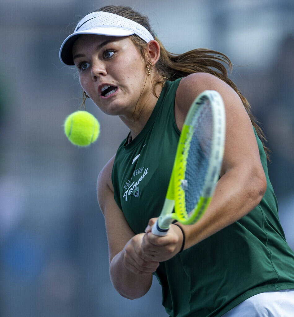 Palo Verde's Remi Rice returns the ball to a Coronado player in their singles match during ...