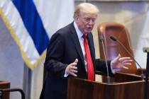President Donald Trump speaks to the Knesset, Israel's parliament, Monday, Oct. 13, 2025, ...