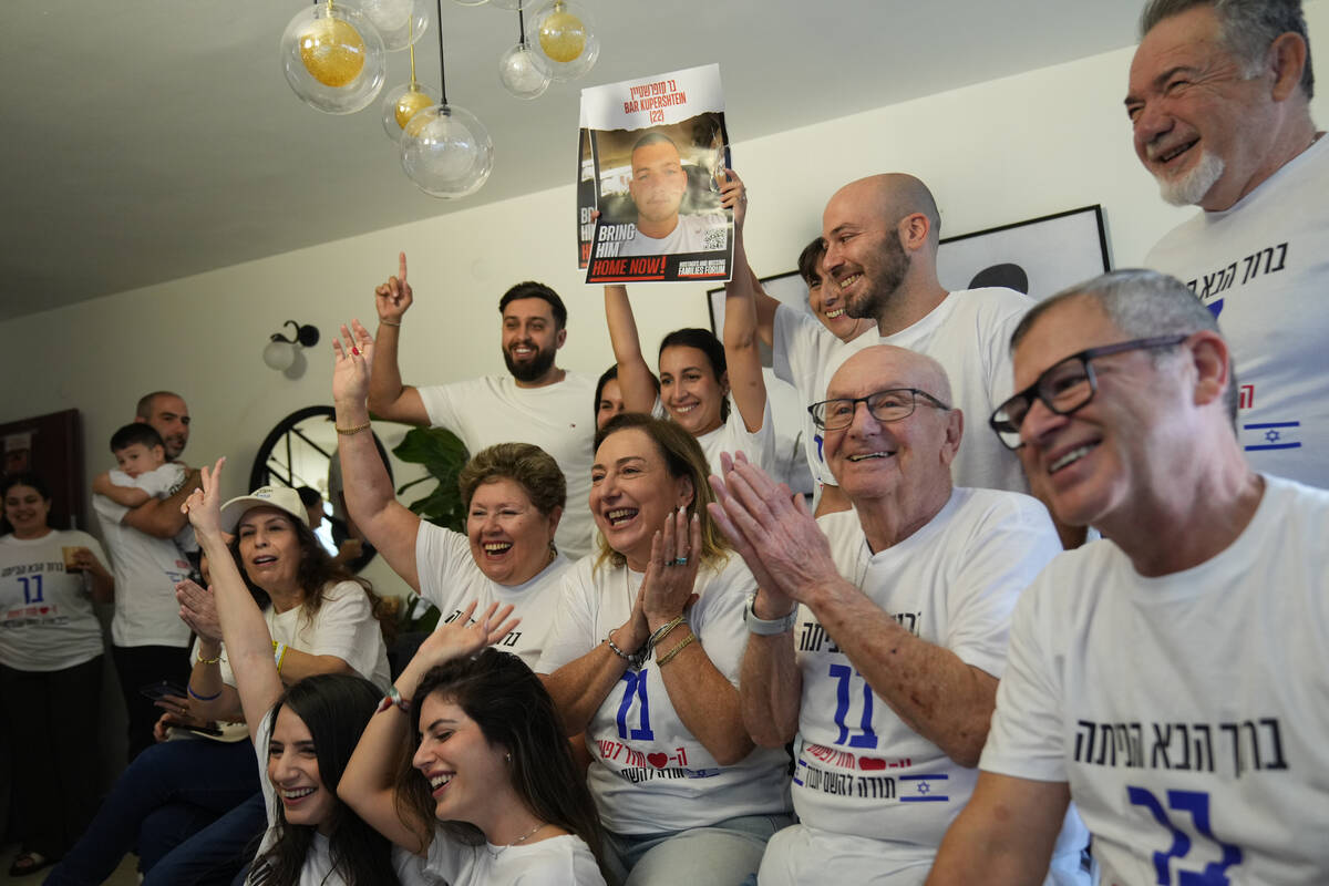 Family and friends of Israeli hostage Bar Kupershtein celebrate as they await the release of Ku ...
