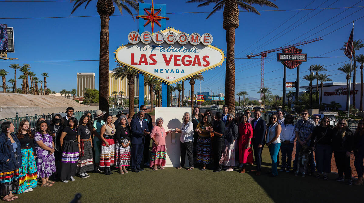 Members of the Native Voters Alliance Nevada, tribal leaders and community members take a photo ...
