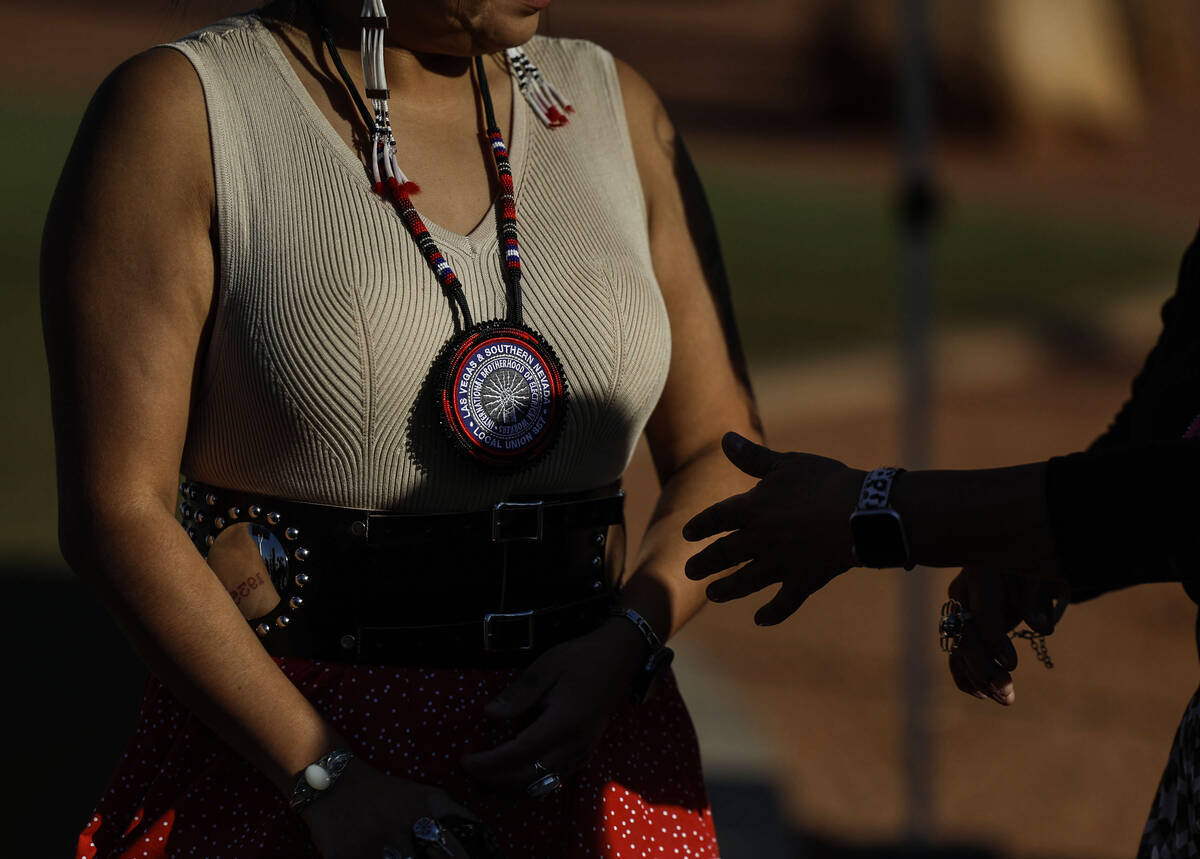 Marissa Duncan, left, socializes during the Indigenous Peoples Day “Welcome to Fabulous Las V ...