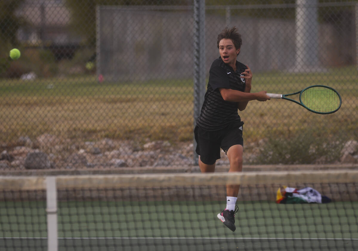 Faith Lutheran's Tyson Young competes against Palo Verde for the 5A boys tennis team state ...