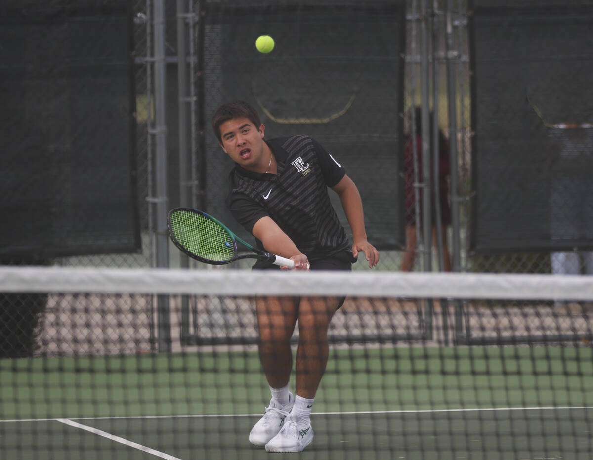 Faith Lutheran’s Sam Gastaldo competes in doubles against Palo Verde for the 5A boys ten ...