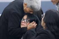 Josephine Tienda, center, the mother of a 2-year-old Nicolas Rodriguez-Tienda, is comforted by ...