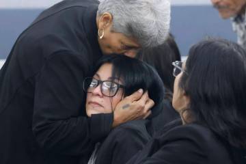 Josephine Tienda, center, the mother of a 2-year-old Nicolas Rodriguez-Tienda, is comforted by ...