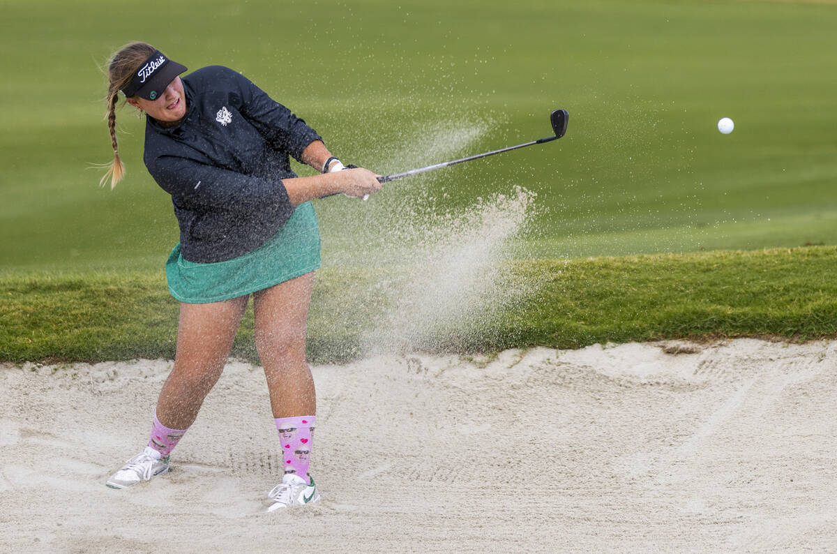 Palo Verde's Sage Parry blasts out of the sand during the 5A girls golf state tournament a ...