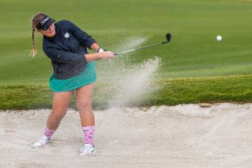 Palo Verde's Sage Parry blasts out of the sand during the 5A girls golf state tournament a ...