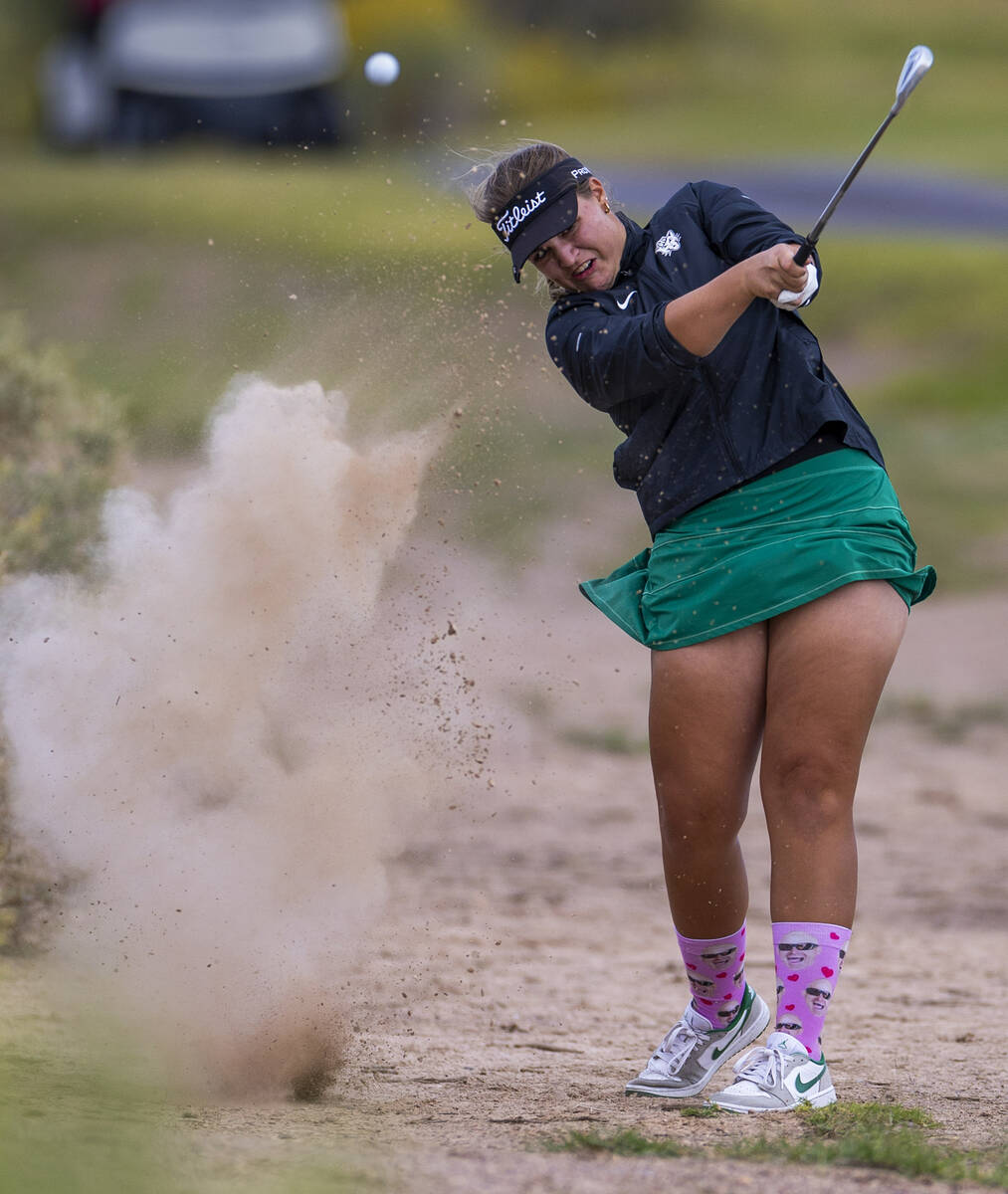 Palo Verde's Sage Parry wedge out of the dirt during the 5A girls golf state tournament at ...