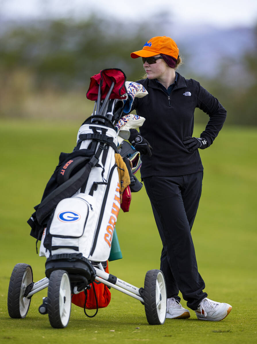 Bishop Gorman's Samantha Harris waits her turn to hit during the 5A girls golf state tourn ...