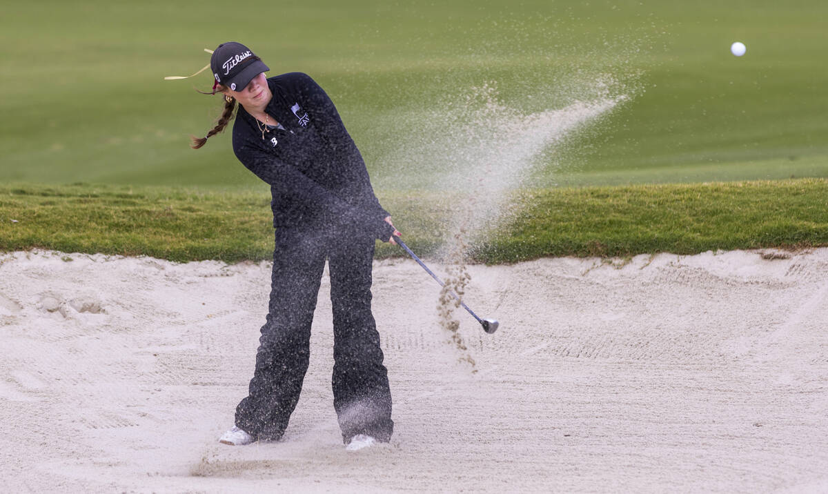 Faith Lutheran's Madison Perez blasts out of the sand during the 5A girls golf state tourn ...