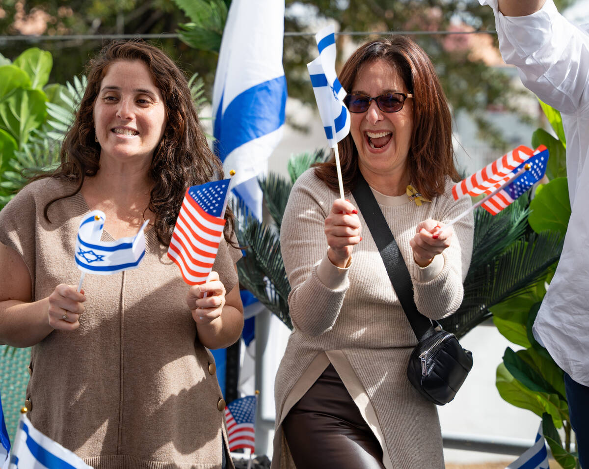 Community members dance and sign during a celebration hosted by the Israeli-American Council ma ...