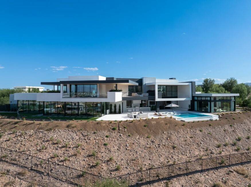Located in The Summit Club at 11588 Stardust Drive, this sprawling mansion “checks a lot of b ...