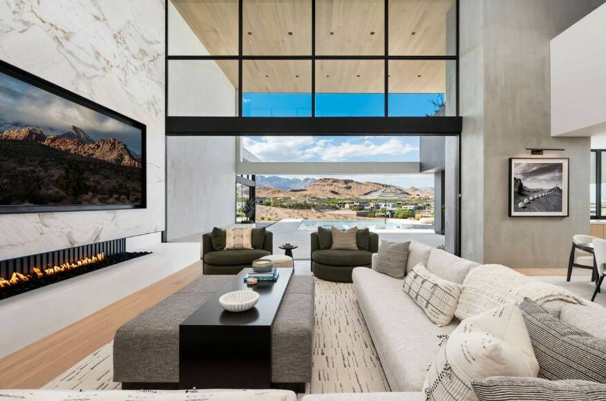 Located in The Summit Club at 11588 Stardust Drive, this sprawling mansion “checks a lot of b ...