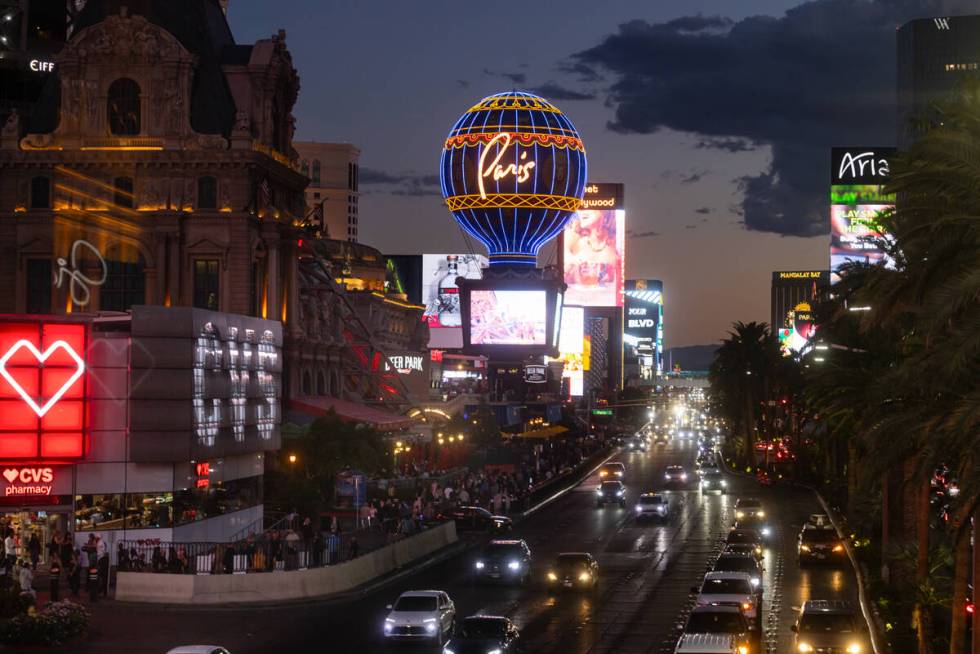 A view looking south down the Las Vegas Strip as seen from a pedestrian bridge at Flamingo Road ...