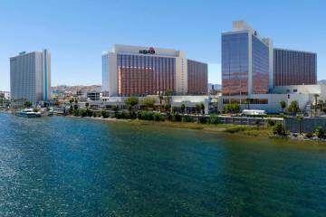 The Edgewater hotel-casino, left, and Aquarius resort-casino near the banks of the Colorado Riv ...