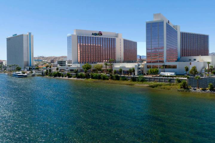 The Edgewater hotel-casino, left, and Aquarius resort-casino near the banks of the Colorado Riv ...
