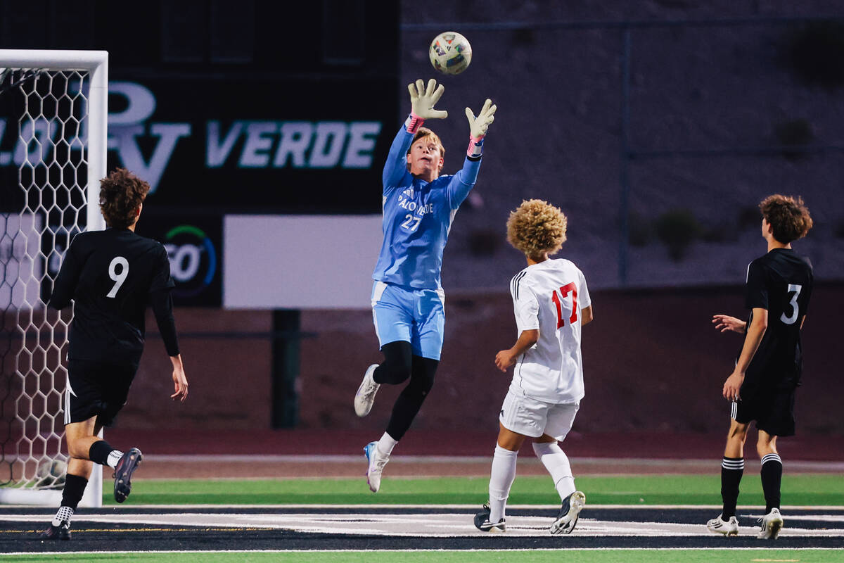 Palo Verde goal keeper Landon Blanchard catches a shot on goal during a high school soccer game ...