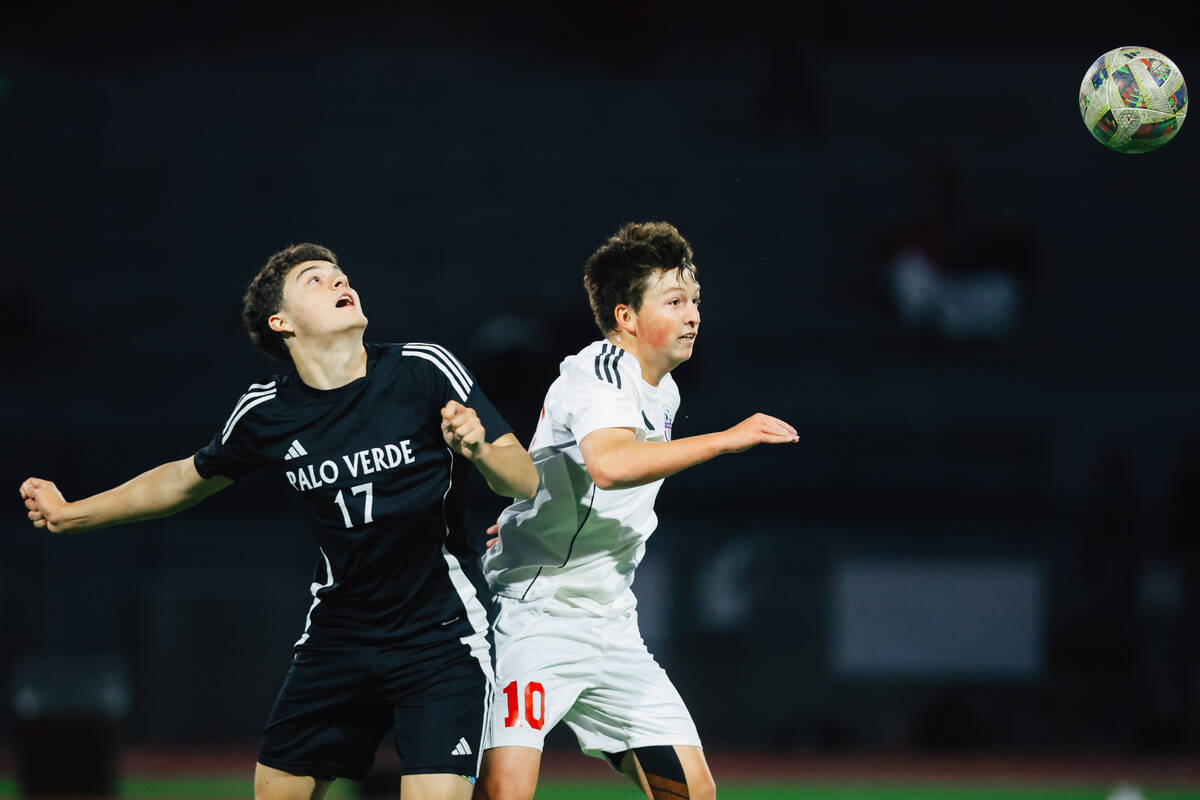 Coronado midfielder Aiden Sena (10) heads the ball during a high school soccer game at Palo Ver ...
