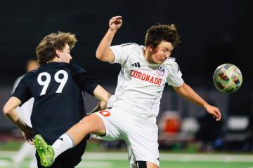 Coronado midfielder Aiden Sena (10) heads the ball during a high school soccer game at Palo Ver ...
