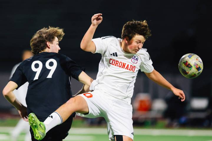 Coronado midfielder Aiden Sena (10) heads the ball during a high school soccer game at Palo Ver ...