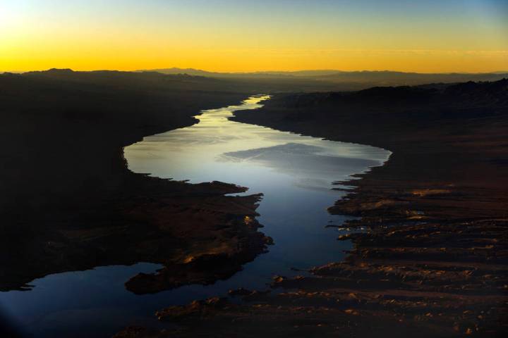 The sun is about to rise above Cottonwood Cove, bottom right, on Lake Mohave along the Colorado ...