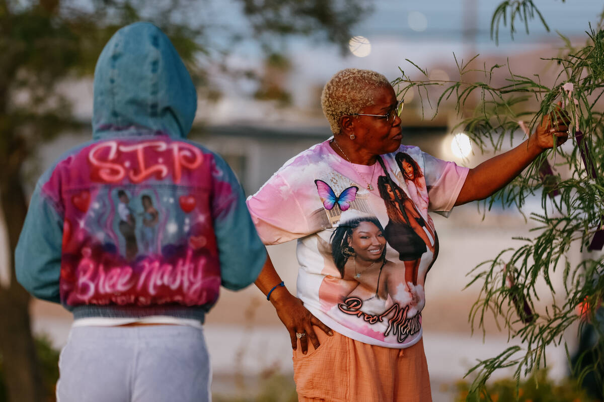 Teases Williams holds up the nametag with the name of her daughter, Breyanna Sotomayor, during ...