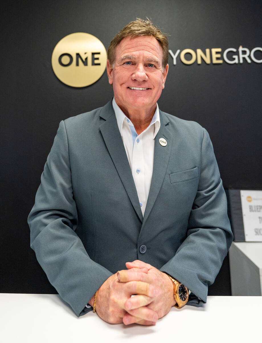 Realtor Tim Kelly Kiernan stands for a portrait in his office at Realty One Group in Las Vegas ...